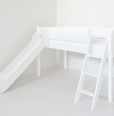 Wild half-high children's bed with slide and inclined ladder